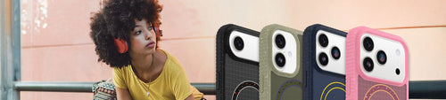 Woman wearing headphones with colorful OtterBox Sole Series phone cases on iPhone 17 devices