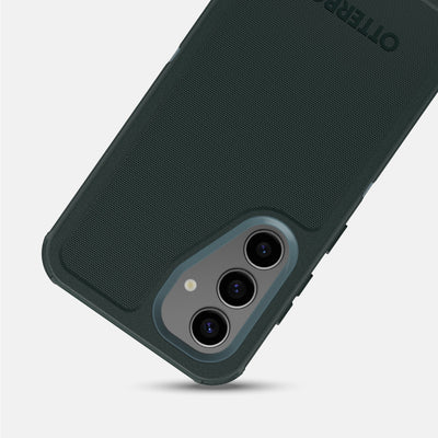 green phone case with 'OTTERBOX' branding on a light gray background