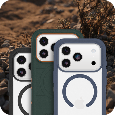 Three Defender Series phone cases with different designs on a natural background